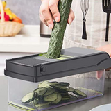 Home & Beyond Co 15-in-1 vegetable chopper with multiple blades and containers for easy vegetable prep and chopping.