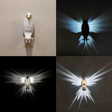 Eagle-shaped wall lamp by Home & Beyond Co featuring a detailed eagle design mounted on a wall.