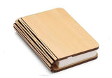3D folding wooden book lamp by Home & Beyond Co, showing a stylish, eco-friendly bedside lamp with a unique book-shaped design.