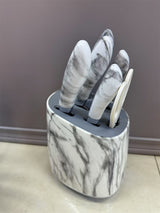 Home & Beyond Co kitchenware knife set with various stainless steel knives displayed on a wooden countertop.