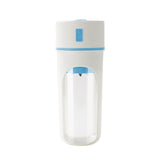 Home & Beyond Co wireless electric juicer blender with orange fruit, ice crushing cup, and USB charging for fresh juice and smoothies.