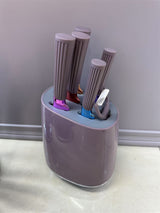 Home & Beyond Co kitchenware knife set with stainless steel blades and black handles, arranged on a wooden countertop.