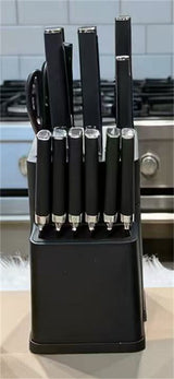 Home & Beyond Co kitchenware knife set with multiple stainless steel knives on a wooden block.