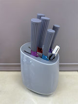 Home & Beyond Co kitchenware knife set with stainless steel knives and black handles, displayed on a wooden countertop.