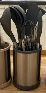 Home & Beyond Co kitchenware knife set with stainless steel blades and black handles, displayed on a wooden countertop.