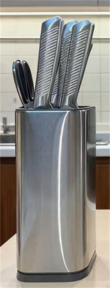 Home & Beyond Co kitchenware knife set with stainless steel blades and wooden handles, displayed on a countertop.