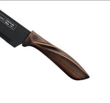 Home & Beyond Co stainless steel chef knife set with various knives displayed on a kitchen countertop.