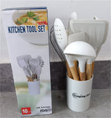 Home & Beyond Co kitchenware knife set with stainless steel knives and black handles on a wooden countertop.