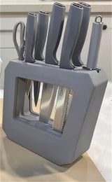 Home & Beyond Co kitchenware knife set with multiple stainless steel knives displayed on a wooden block.