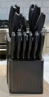 Home & Beyond Co kitchenware knife set with stainless steel knives and black handles, displayed on a wooden countertop.