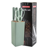 Home & Beyond Co kitchenware knife set with stainless steel blades and black ergonomic handles, displayed on a wooden countertop.