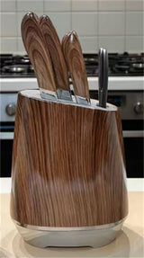 Home & Beyond Co kitchenware knife set with stainless steel knives and wooden block, displayed on a countertop.