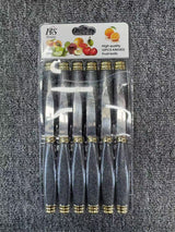 Set of Home & Beyond Co kitchenware knives with stainless steel blades and black ergonomic handles arranged on a wooden block.