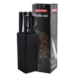 Home & Beyond Co kitchenware knife set with stainless steel blades and black handles, displayed on a wooden countertop.