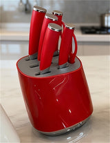 Home & Beyond Co kitchenware knife set with multiple stainless steel knives on a wooden cutting board.
