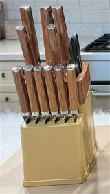 Home & Beyond Co kitchenware knife set with stainless steel blades and black handles, displayed on a wooden countertop.