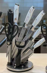 Home & Beyond Co kitchenware knife set with stainless steel blades and black handles, displayed on a countertop.