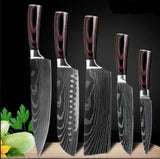 Home & Beyond Co carpenter's special 6 and 8-piece kitchen knife set with chef and utility knives on a cutting board.