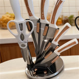 Home & Beyond Co kitchenware knife set with stainless steel blades and black handles displayed on a countertop.