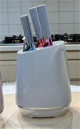 Home & Beyond Co kitchenware knife set with stainless steel blades and black handles, displayed on a wooden countertop.