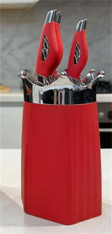 Home & Beyond Co kitchenware knife set with various stainless steel knives on a wooden countertop.
