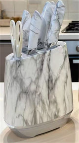 Home & Beyond Co kitchenware knife set with various stainless steel knives displayed on a wooden countertop.