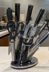 Home & Beyond Co kitchenware knife set with stainless steel blades and wooden handles, displayed on a wooden countertop.