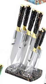 Home & Beyond Co kitchenware knife set with stainless steel blades and black handles, arranged on a wooden cutting board.