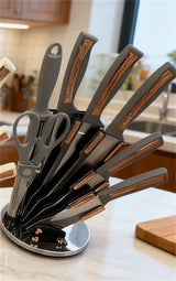 Home & Beyond Co kitchenware knife set with stainless steel blades and ergonomic handles, displayed on a kitchen countertop.